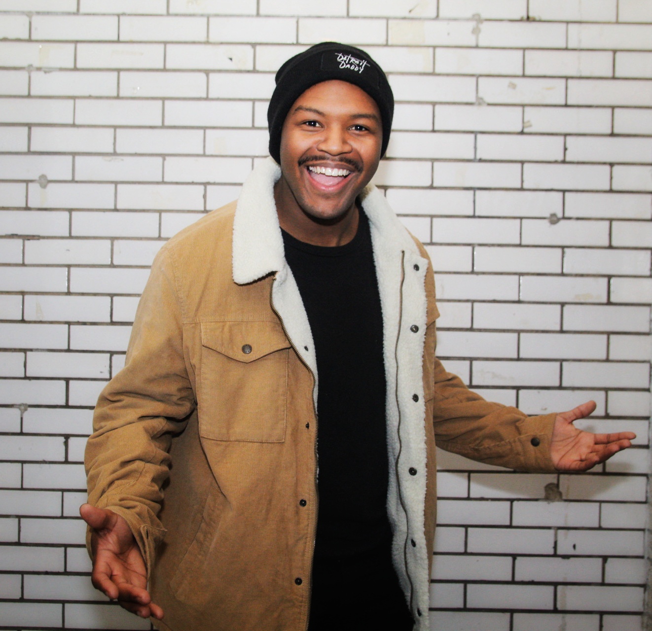 Photo of Comedian Jon Tut.